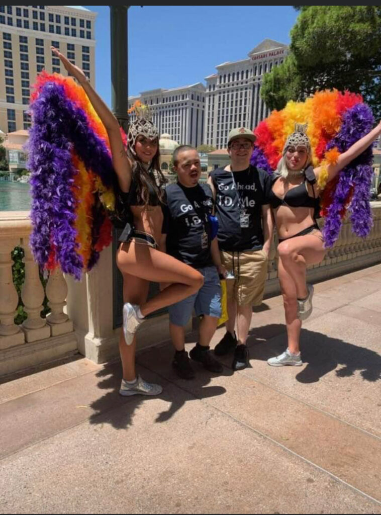 Andrew and Justin with Las Vegas showgirls
